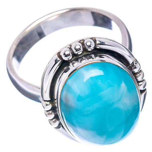 Oval light-blue larimar cabochon ring in .925 sterling silver band with bead bezel