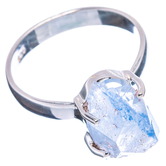 Sterling silver ring with prong-set faceted light blue quartz stone and open band