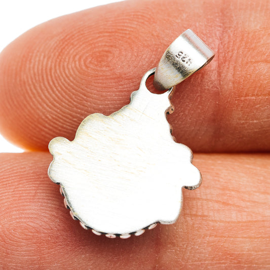 Sterling silver pendant back with scalloped edge and embossed Southwestern-style design