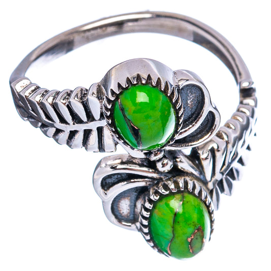 Adjustable 925 sterling silver ring with two green oval cabochon stones and open band