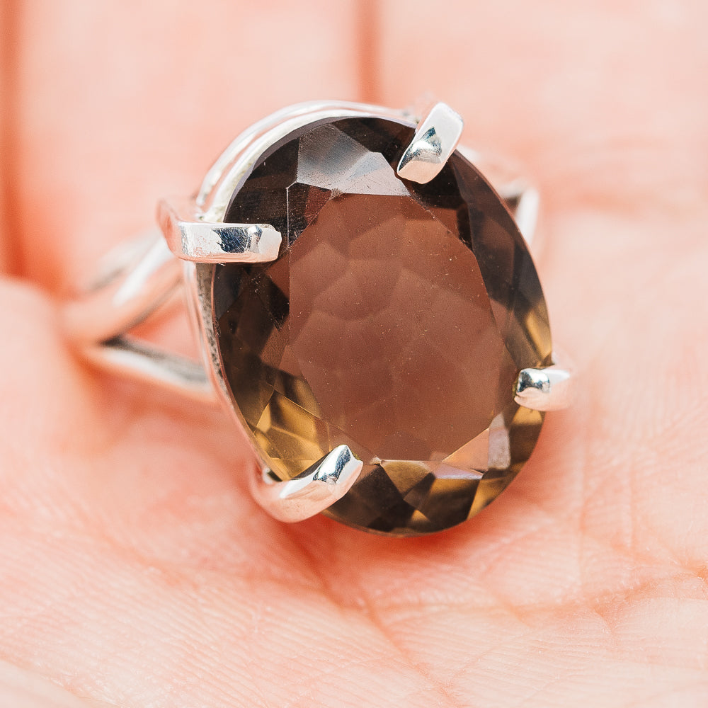 Oval smoky quartz ring, dark brown faceted stone in silver setting with curled prong tips