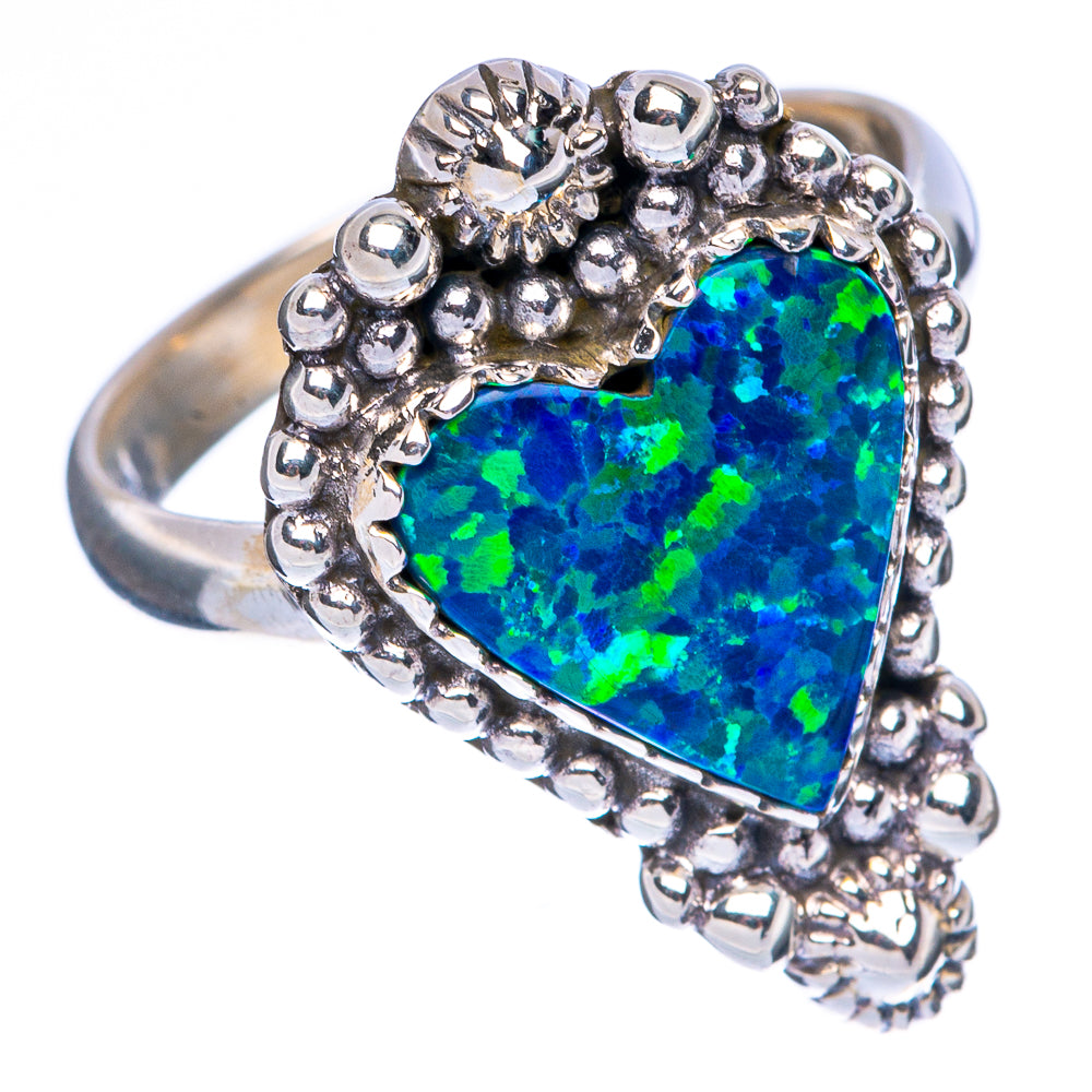 Sterling silver opal ring with teardrop blue-green synthetic stone and raised beaded border