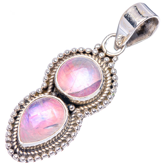 Pink moonstone pendant with two oval cabochons, ornate silver beaded frame and bail