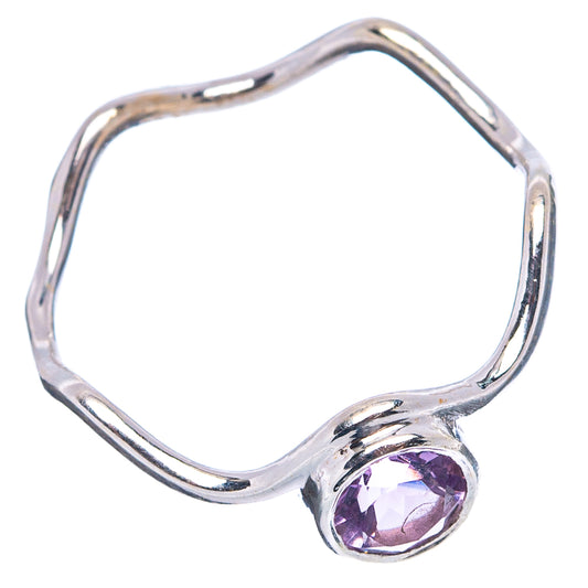 Sterling silver amethyst ring with faceted purple gemstone and wavy open band