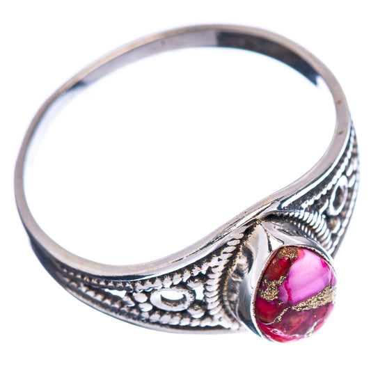 Ornate .925 sterling silver oval-stone ring with pink and red cabochon, side view