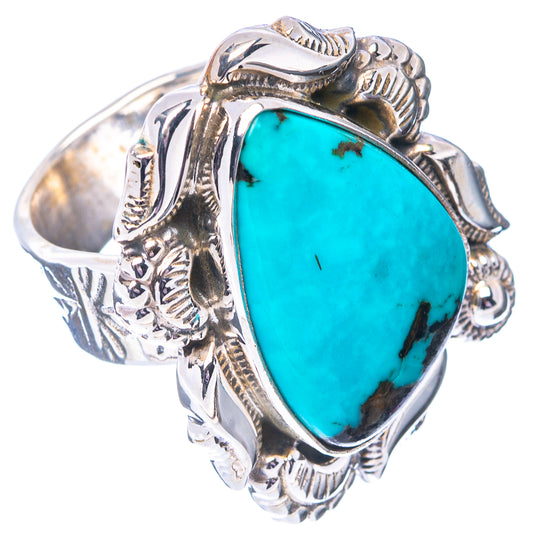Turquoise oval cabochon sterling silver ring with embossed floral scrollwork sides