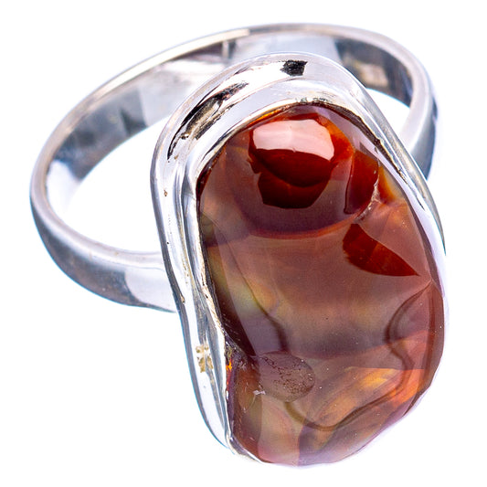 Sterling silver oval fire agate ring with wide band, reflective stone with red highlights