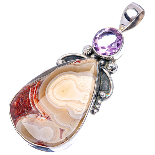 Sterling silver oval pendant with amethyst round bezel and Crazy Lace Agate center
