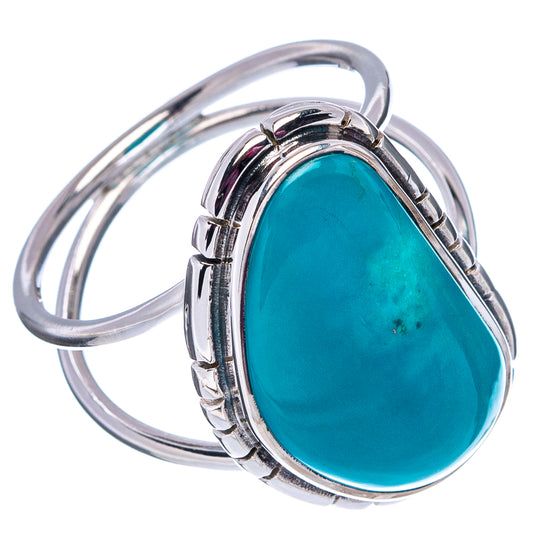 Sterling silver turquoise oval cabochon ring with open, curved band detail