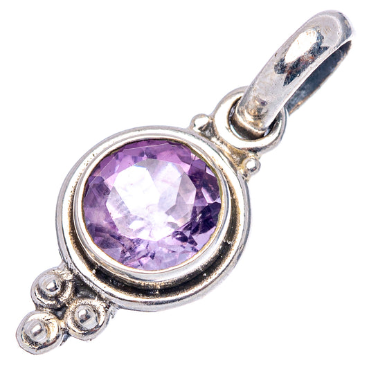 Round amethyst pendant in polished .925 sterling silver with decorative prongs and bail