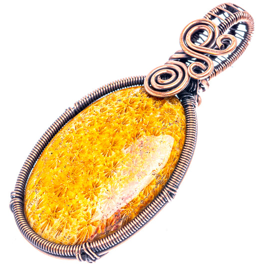 Oxidized copper wire-wrapped oval pendant with yellow fossil coral cabochon detail
