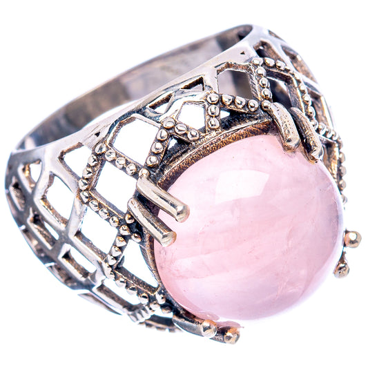 Sterling silver filigree ring with oval pink rose quartz gemstone, filigree side settings