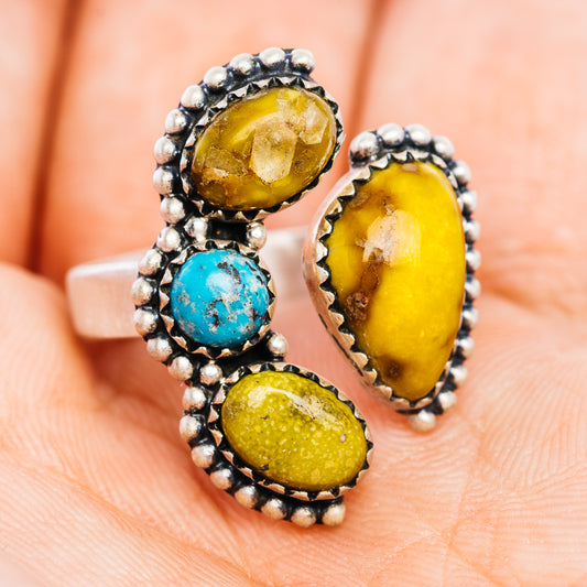 Adjustable turquoise and yellow oval stone ring with silver bead borders