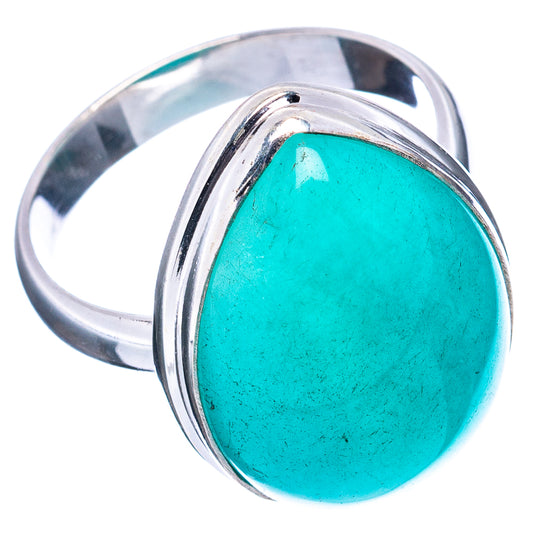 Sterling silver ring with oval turquoise cabochon, side view of gemstone setting