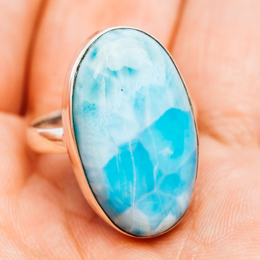 Oval sky-blue larimar cabochon ring with sterling silver bezel, front view