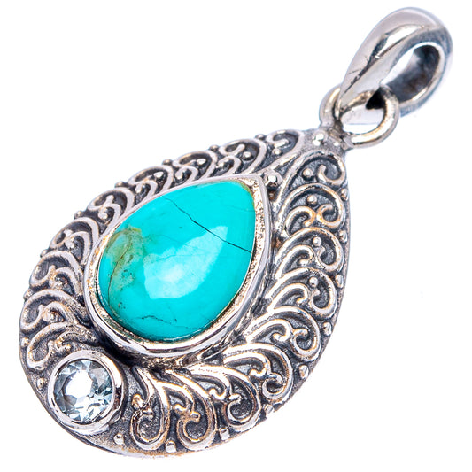 Sterling silver pear pendant with turquoise stone, decorative filigree edging, two round gems