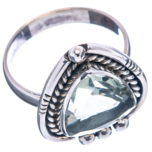 Sterling silver ring with pale green faceted oval gemstone and braided rope setting
