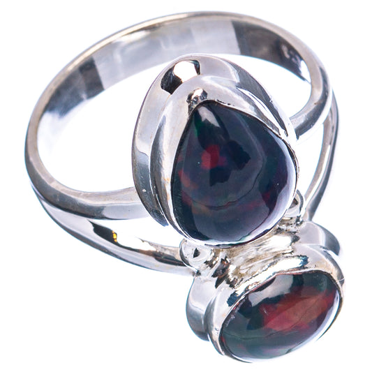 Silver oval opal ring with stacked black and dark red cabochons, open shank