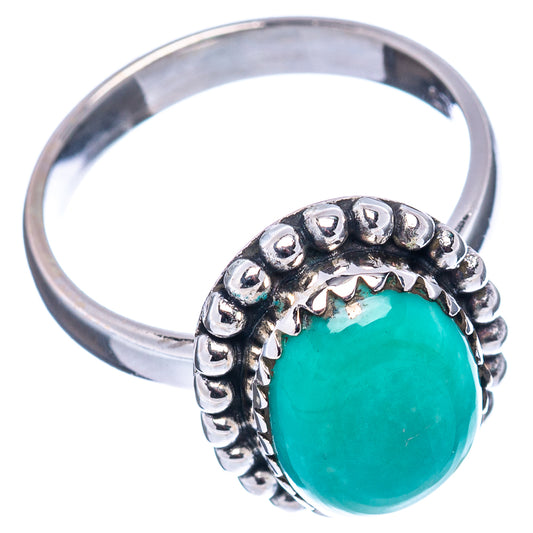 Sterling silver ring with oval turquoise stone and raised bead gallery setting