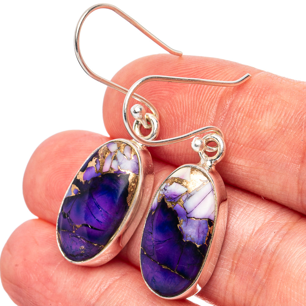 Oval purple stone dangle earrings with gold-tone bezel and sterling silver hooks