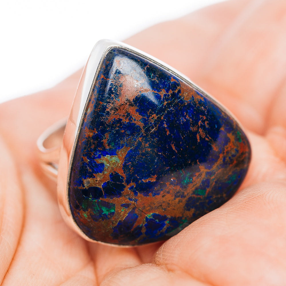 Sterling silver ring with blue azurite and copper veining, teardrop bezel