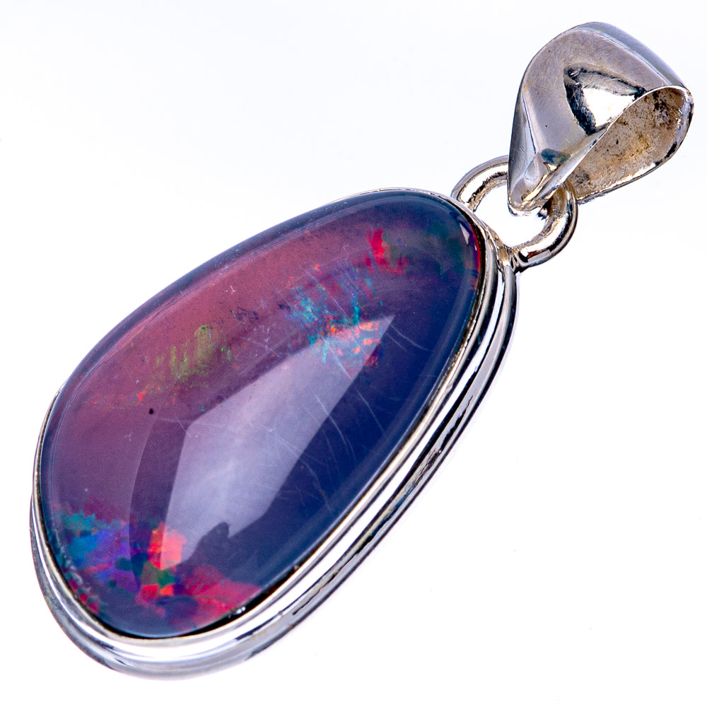 Sterling silver opal pendant with purple-blue oval cabochon and hooked bail