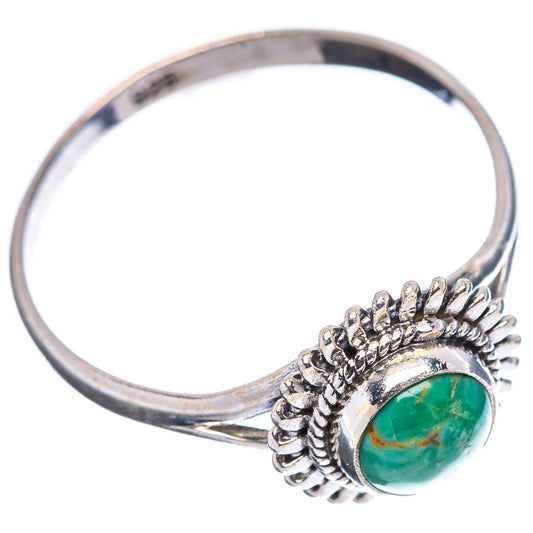 Sterling silver turquoise ring with oval green cabochon and scalloped bezel