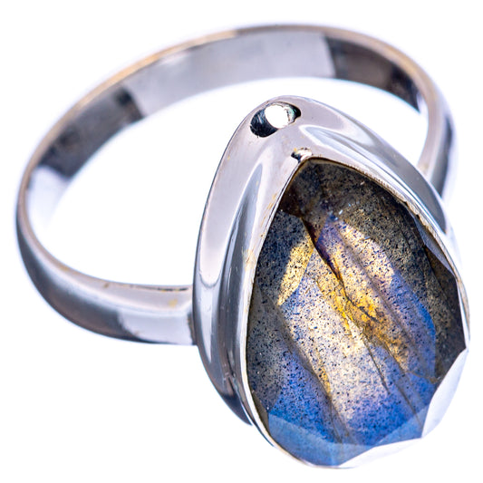 Oval faceted labradorite ring in 925 sterling silver with polished bezel setting