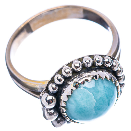 Sterling silver band ring with blue round cabochon and beaded edge, size 7