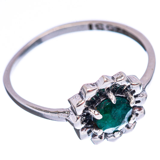 Sterling silver ring showing green gemstone in raised prong setting, side view