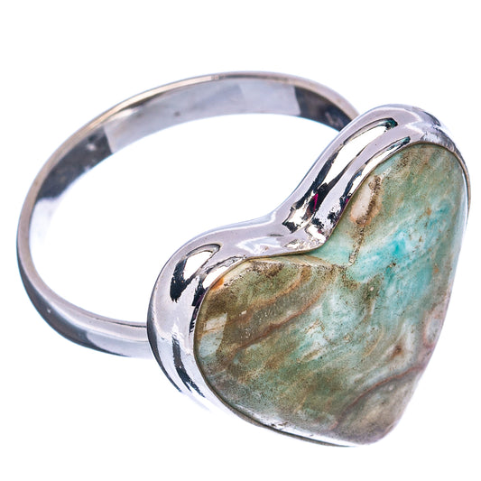 Heart-shaped sterling silver ring with green-blue aragonite heart center, side view