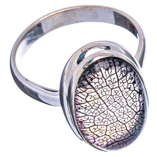 Sterling silver ring with oval iridescent crackle opal center, side view