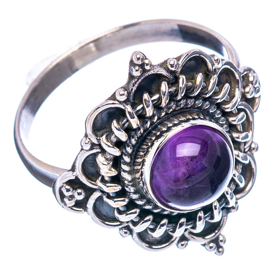 Amethyst cabochon sterling silver ring with ornate oval setting and openwork prongs