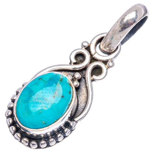 Sterling silver turquoise pendant, oval bezel with beaded edge and ornate side scrolls