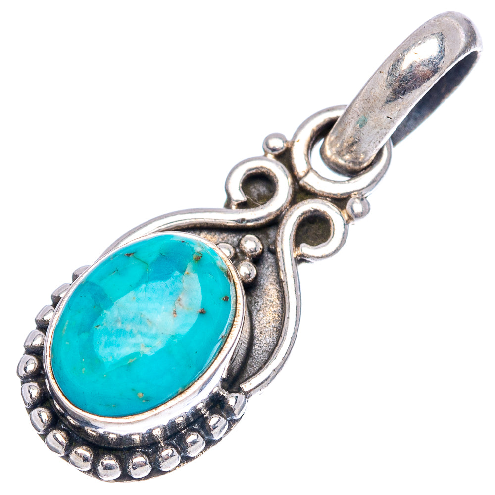 Sterling silver turquoise pendant, oval bezel with beaded edge and ornate side scrolls