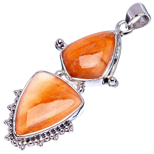 Peach moonstone teardrop pendant pair in .925 sterling silver with scalloped frame