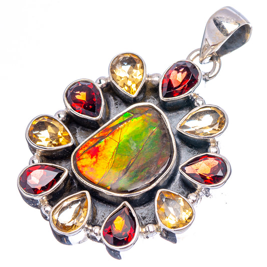 Silver bail top on iridescent green-red cabochon pendant with red and yellow gemstone accents