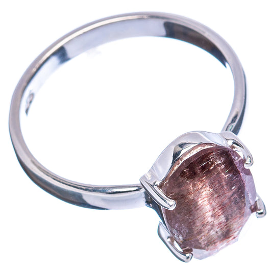 Sterling silver ring with raised oval dark reddish stone, prong-set, size 7