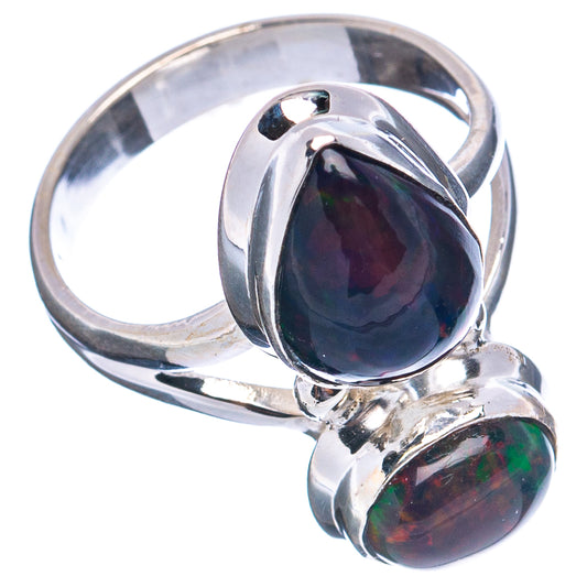 Sterling silver ring angled view with two dark opal cabochons, green-red iridescence