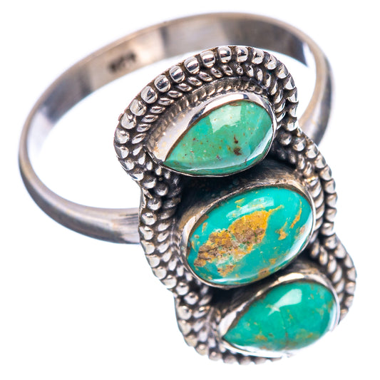 Sterling silver ring with three oval turquoise cabochons in a textured bezel