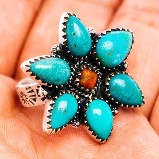 Adjustable .925 sterling silver ring with turquoise cabochons and amber center stone