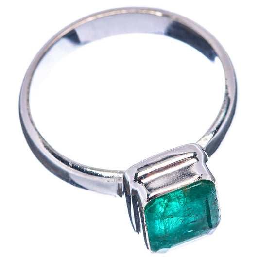 Polished sterling silver ring with square green emerald in a bezel setting