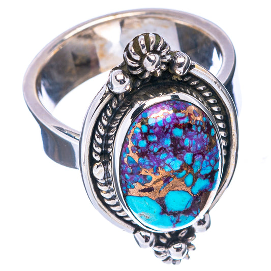 Sterling silver oval turquoise ring with carved bezel, purple-blue stone, side view