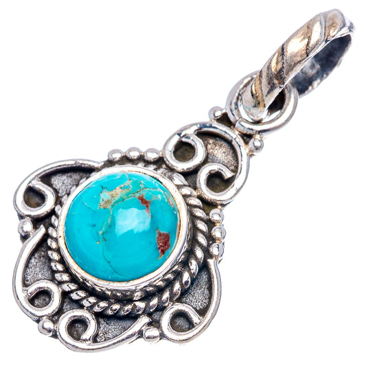 Turquoise cabochon pendant in antique-style sterling silver frame with top bail
