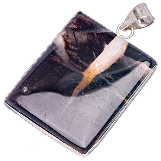 Rectangular black and gray banded agate pendant with silver bail, angled view.