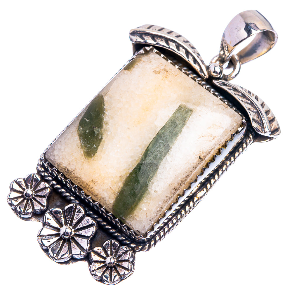 Rectangular quartz pendant with green tourmaline, silver floral setting and bail