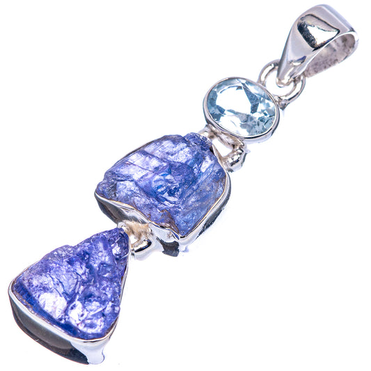 Sterling silver pendant with rough blue stones and round faceted light-blue topaz