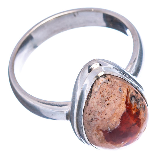 Sterling silver fire opal ring with oval red-orange stone and smooth band