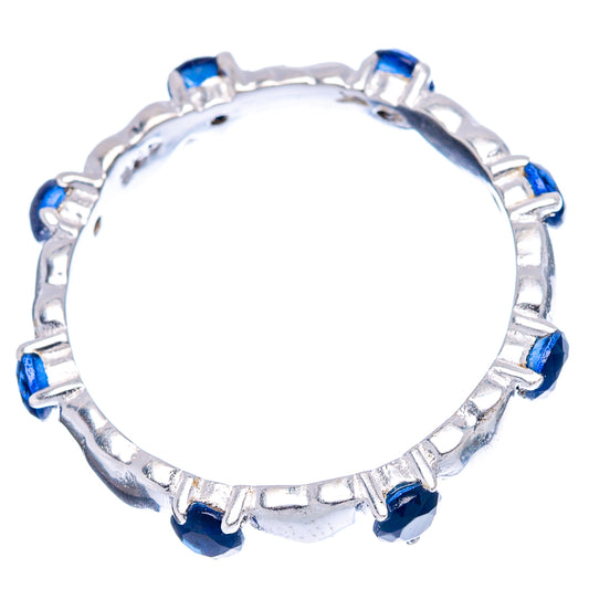 Sterling silver ring with multiple round blue quartz stones along the band