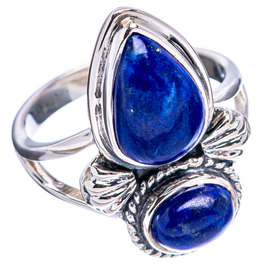 Sterling silver ring with large teardrop lapis stone and smaller stone below, scalloped frame